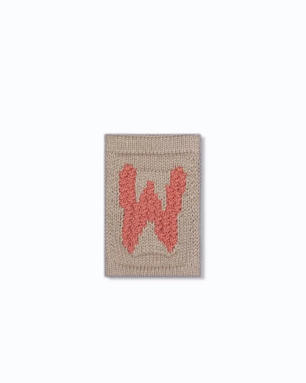 Strikket bogstav W, rosa